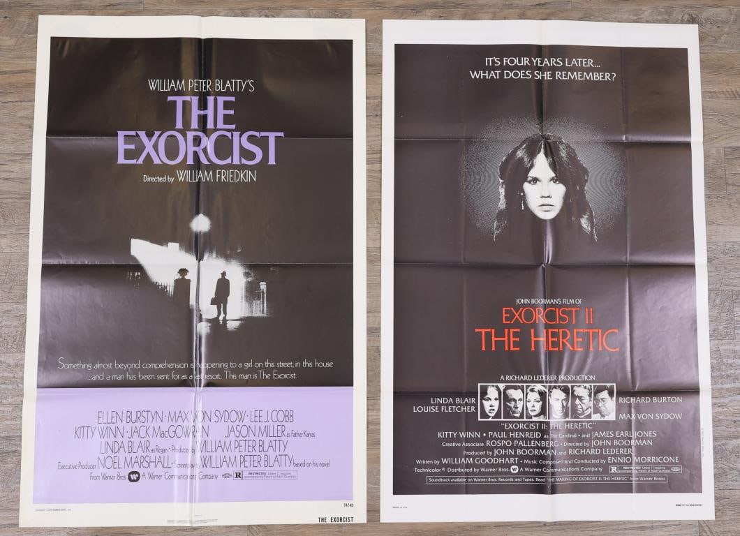 The Exorcist Posters: Includes The Exorcist original 1974 one sheet movie poster and The Exorcist 2: The Heretic 1977 one sheet movie poster, folded. 41”h x 27”w.