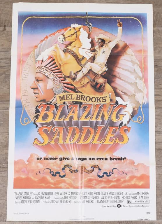 Blazing Saddles Poster: Blazing Saddles 1974 one sheet movie poster, folded. 41”h x 27”w. Artwork by John Alvin.