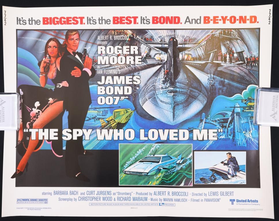 The Spy Who Loved Me Poster: The Spy Who Loved Me 1977 half sheet movie poster, rolled. 22”h x 28”w. Tape residue on back.