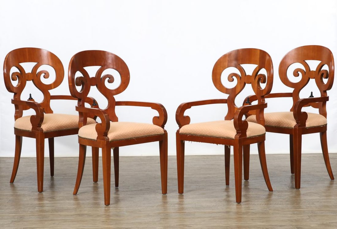 Biedermeier Style Dining Chairs: Cherry veneer with rounded crests and scrolled pierced splats having a center finial, continuous scrolled arms on tapered legs, textured upholstered seats. 39"h x 22"w x 21"d, 19" seat height