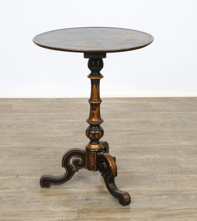 Victorian Chinoiserie Candle Stand: Black lacquered and hand painted with a relief carved figural and landscape motif circular top, turned pedestal, three scrolled legs. 27"h x 15"d