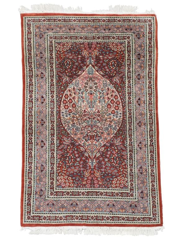 Persian Tabriz Prayer Rug: Hand knotted with a flowering tree of life motif with meandering floral and cloud band inner and outer borders and an alternating floral and vine main border in polychrome colors of red, pink, mauve,