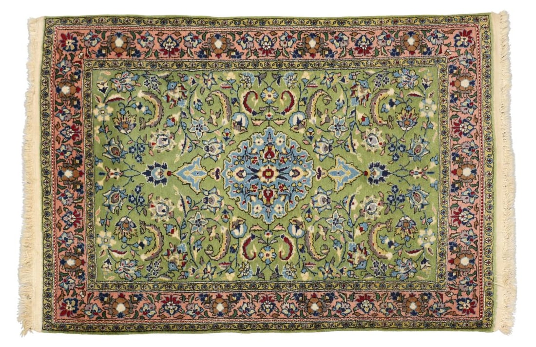 Persian Tabriz Rug: Hand knotted having a curvilinear central pendant medallion with an all over floral, vine, and leaf field in a lime green ground, with an alternating palmette cartouche main border in other