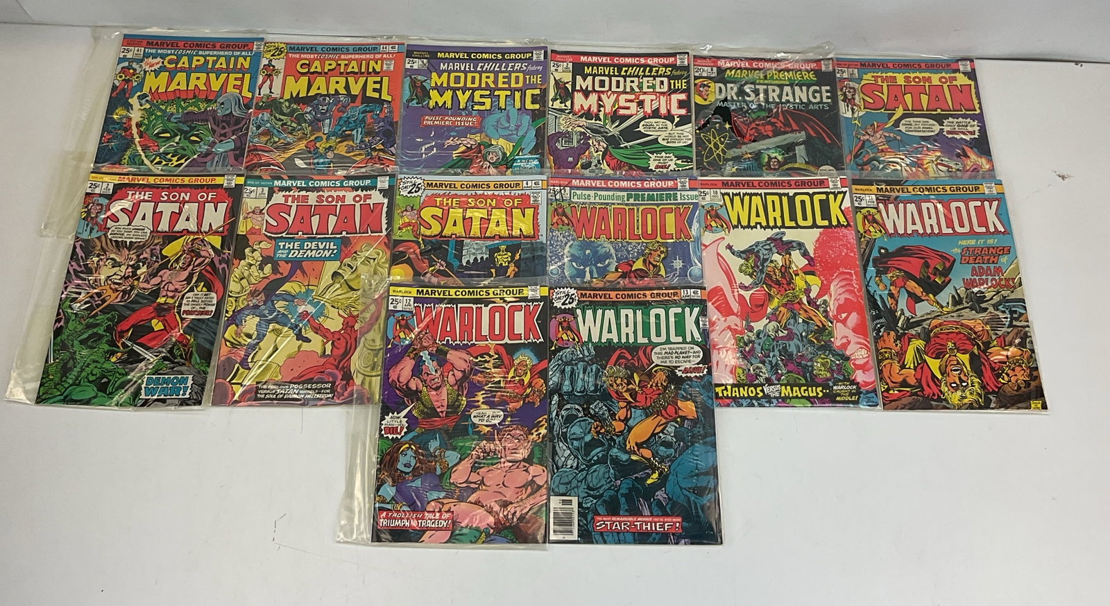 Marvel Grab Bag: Captain Marvel #41, #44. Modred the Mystic #1, #2. Marvel Premiere #8. Warlock #9, #10, #11, #12, #13. The Son of Satan #1, #2, #3, #4. Condition varies.