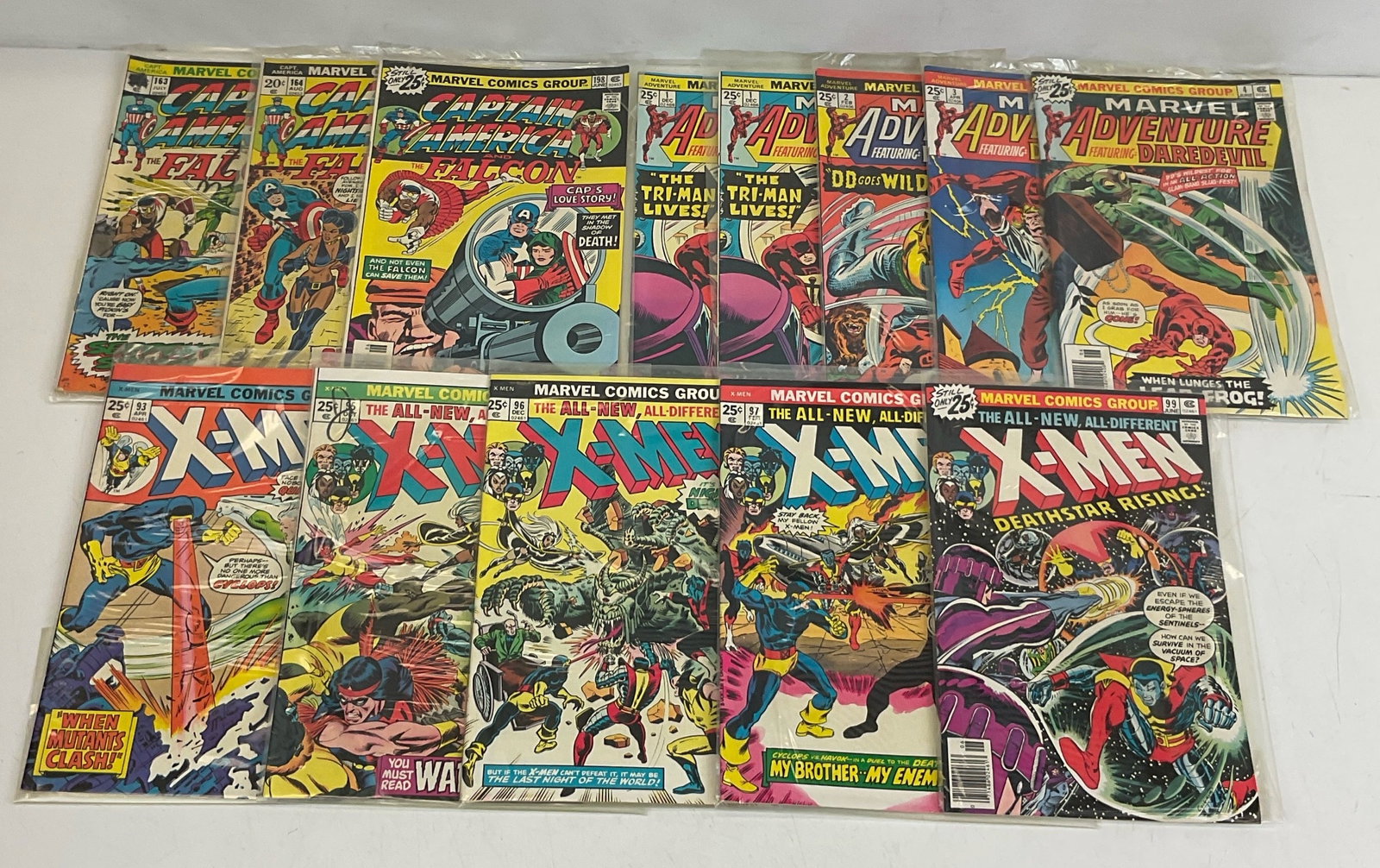 Marvel Grab Bag: X-Men #93, #95, #96, #97, #99. Captain America and the Falcon #163, #164, #198. Marvel Adventure #1, #1, #2, #3, #4. Condition varies.