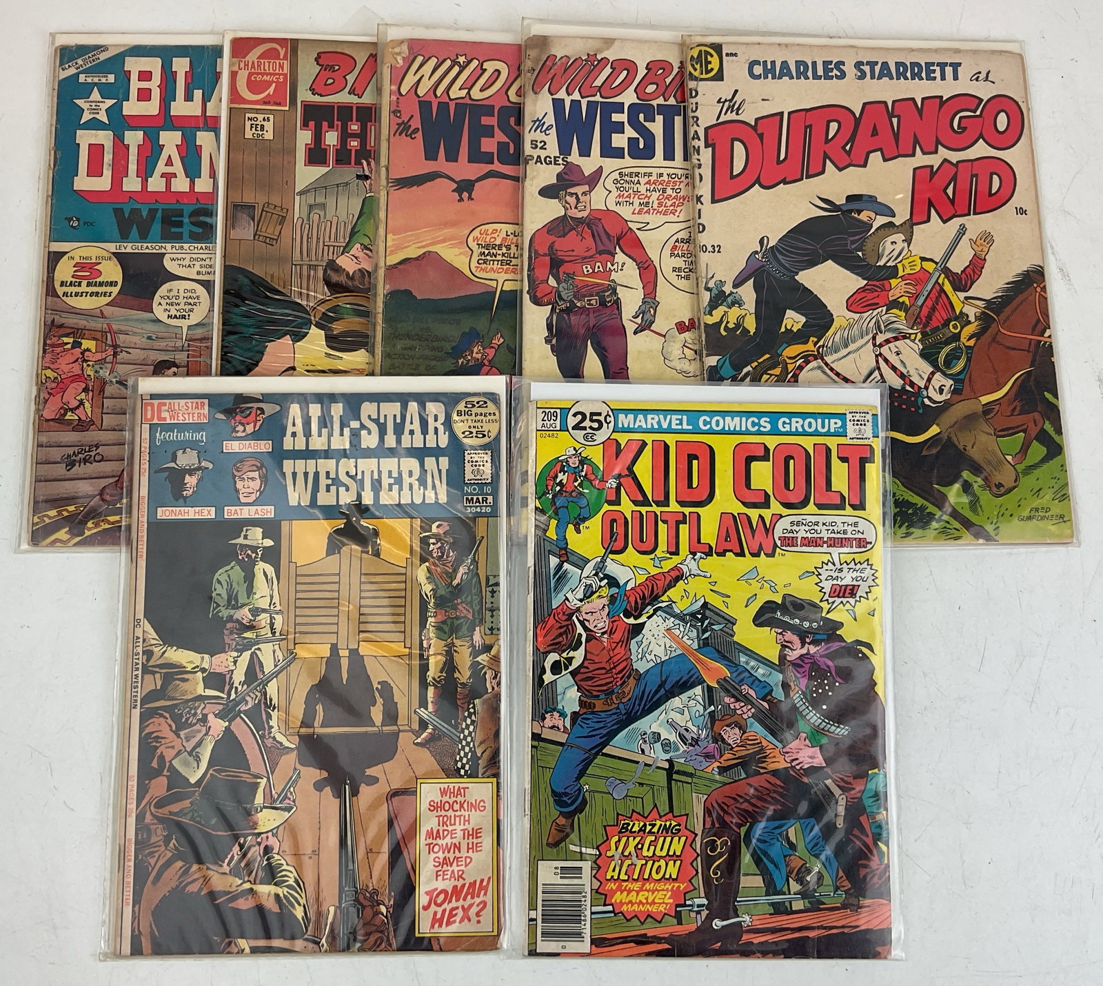 Western Comics: (7) Assorted Western comics including Kid Colt Outlaw, All Star Western and Billy the Kid. Condition varies.