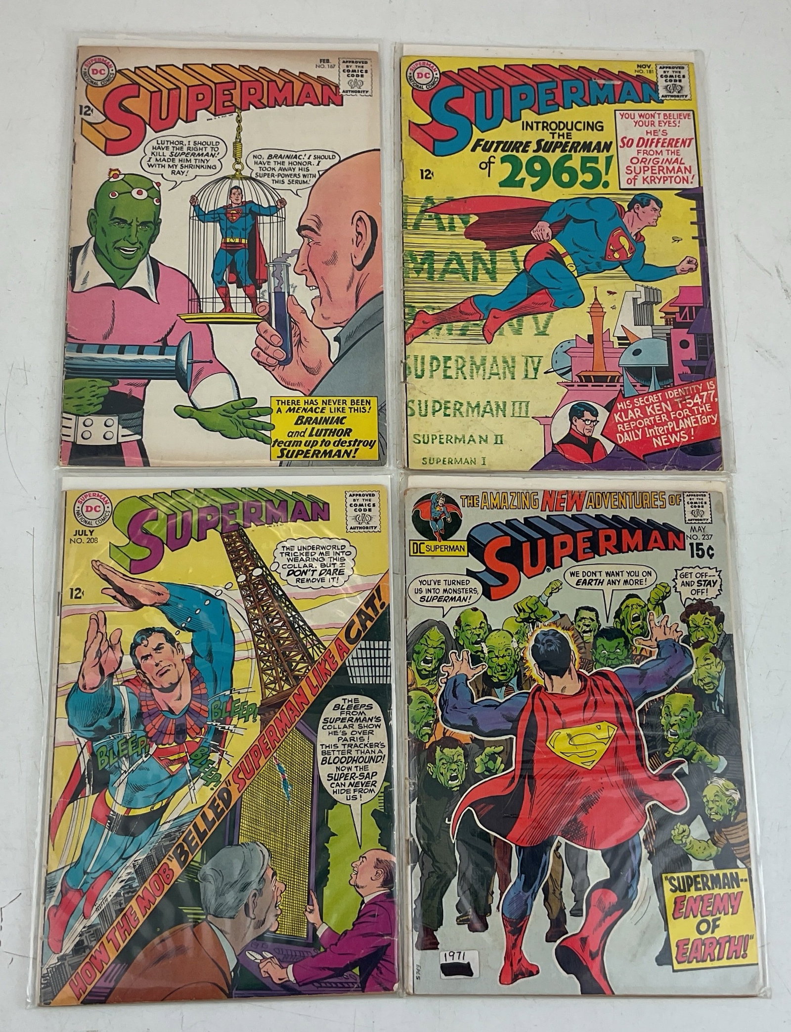 Superman Comics: (4) Superman Comics #167, #181, #208 and #237. Condition varies.