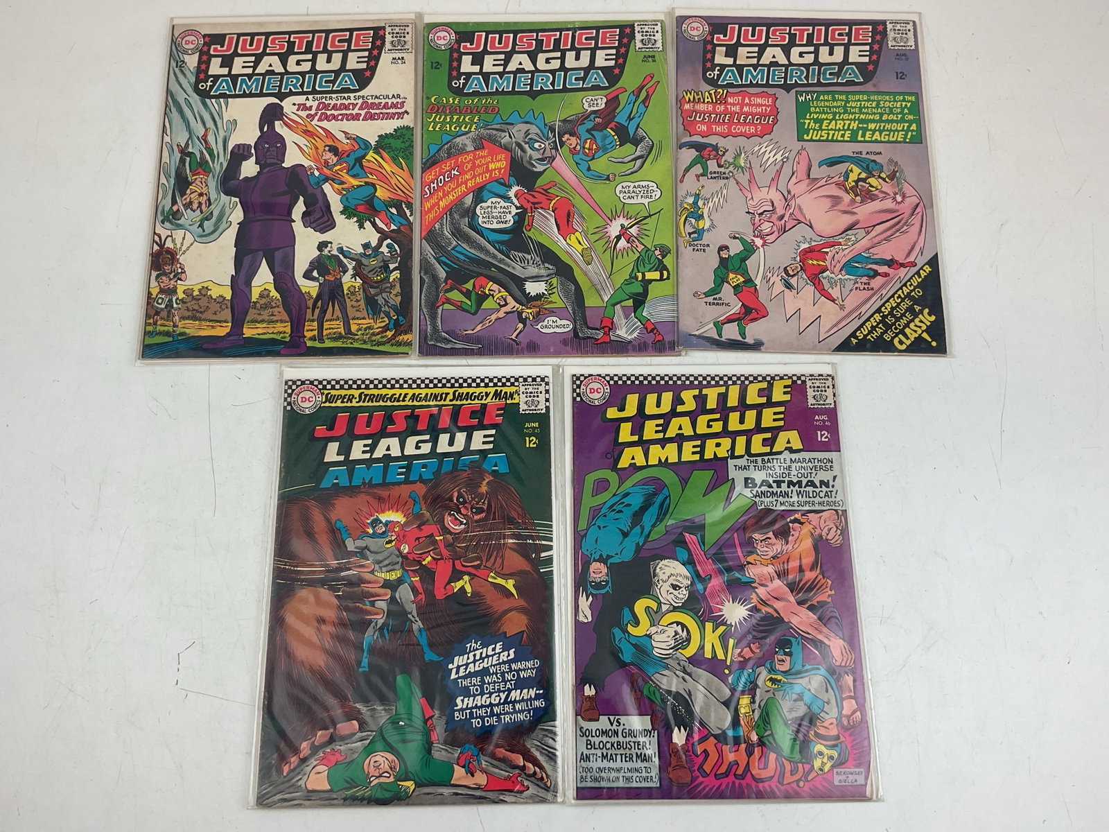 Justice League of America Comics: (5) Justice League of America Comics, issues #34, #36, #37, #45 and #46. Condition varies.