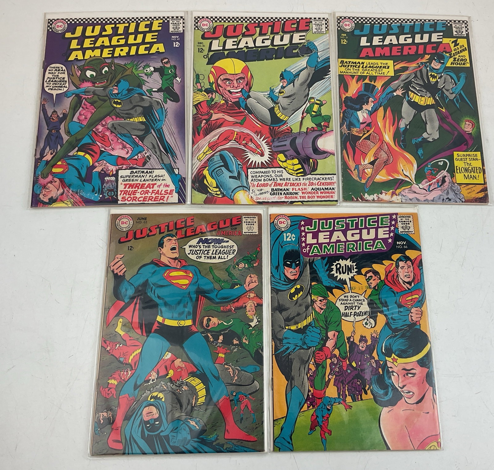 Justice League of America Comics: (5) Justice League of America comics issues #49-#51, #63 and #66. Condition varies.