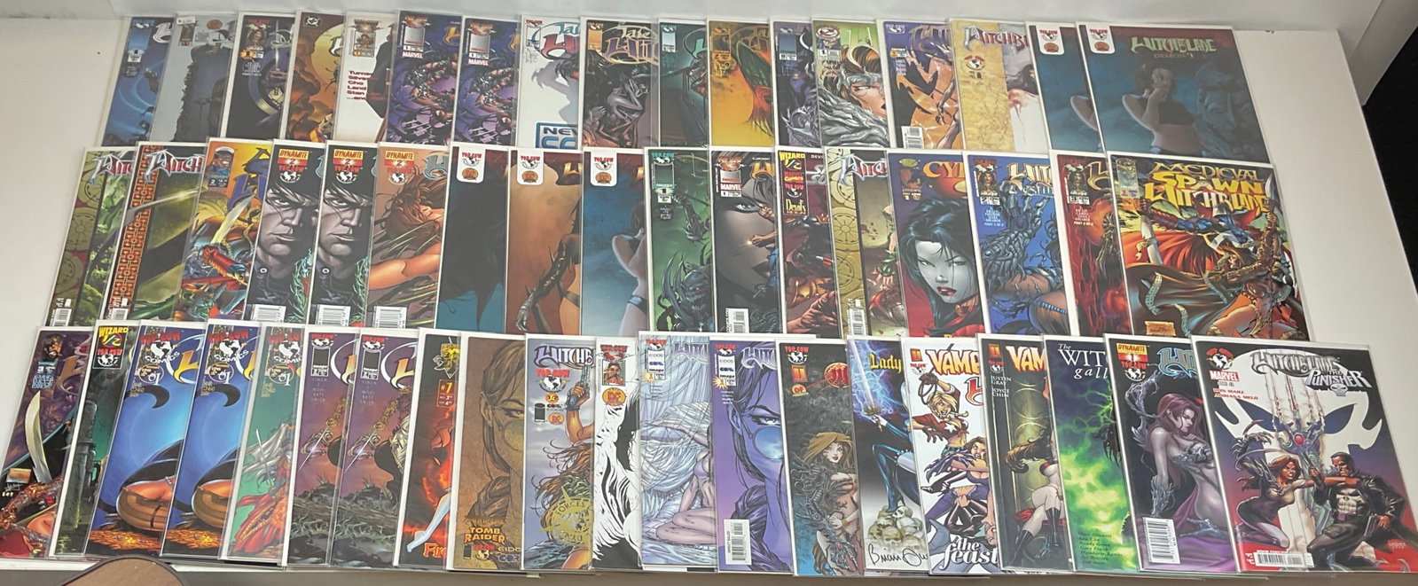 Asst. Witchblade Crossovers and Alternate spin-off Series: Tales of the Witchblade, Witchblade Demon #1, Medieval Spawn Witchblade, Witchblade The Punisher, Witchblade Tomb Raider, Witchblade Tomb Raider 1/2, Witchblade Shades of Gray, The Witchblade gallery,
