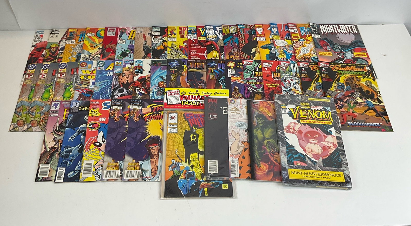 Mixed Publisher Grab Bag: Nightwatch #1. Venom The Madness #1, #2, #3. Tales to Astonish. Archie Meets The Punisher #1. The Punisher Meets Archie #1. Blackwulf #1. Gargoyles #1. The Lion King #1. Spider-Man The Arachnis