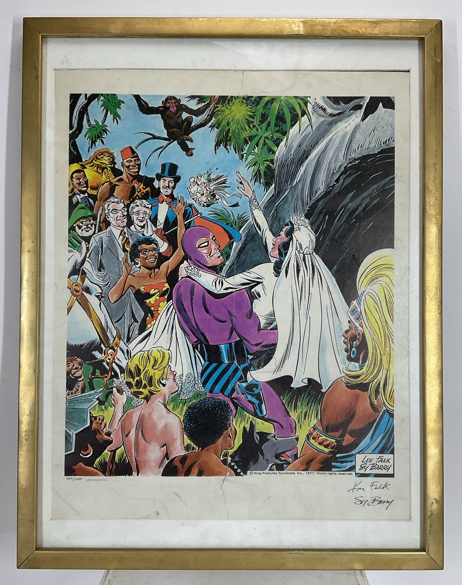 Lee Falk & Sy Barry The Phantom Framed Print: Framed limited edition comic art print of The Phantom by Lee Falk and Sy Barry. The artwork is marked 502/1500 and features signatures from both creators, alongside a 1977 King Features Syndicate,