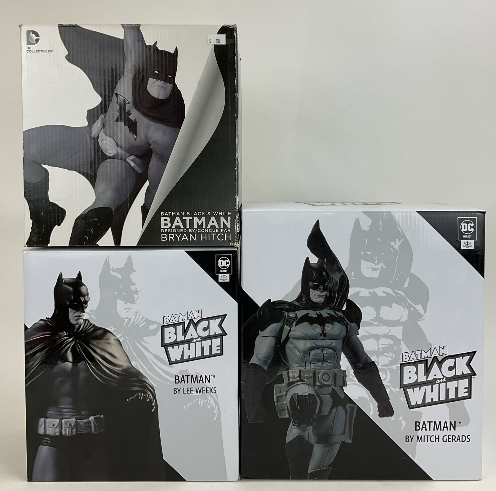 DC Collectibles Batman Black & White Statues (3): DC Collectibles and McFarlane Toys limited edition Batman Black & White statues (3), includes a 6.25-inch Bryan Hitch design (0888 of 5200), a 7-inch Lee Weeks design (109 of 640), and an 8.2-inch Mit