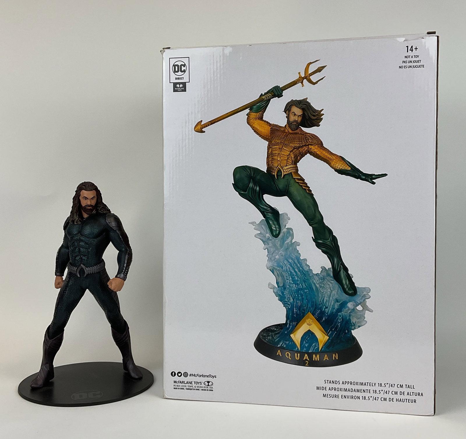 DC Direct McFarlane Aquaman Collectibles: DC Direct McFarlane Toys collectibles (2), includes a limited edition Aquaman and the Lost Kingdom statue numbered 124 of 200 in original packaging and an unboxed DC Aquaman dark suit statue.