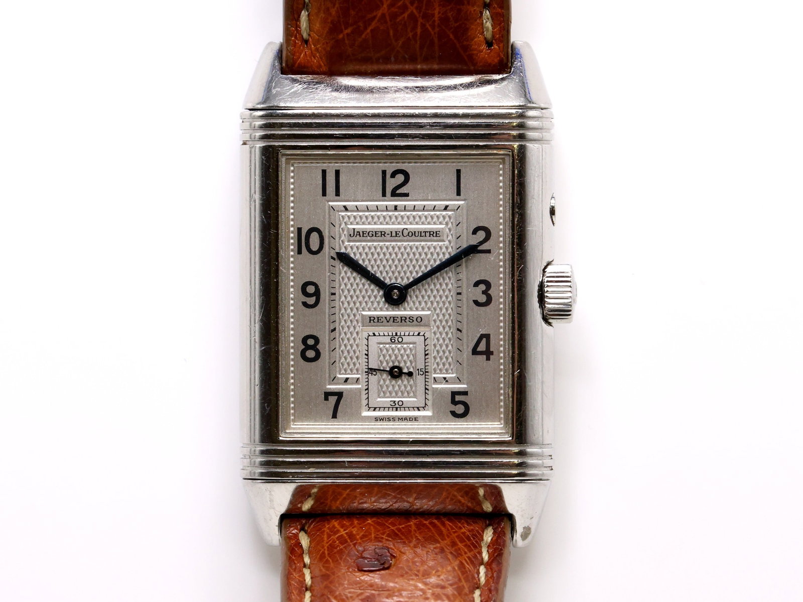Jaeger LeCoultre Reverso Duoface Ref. 270.8.54: Jaeger LeCoultre Reverso Duoface Ref. 270.8.54 manual wind wristwatch, Switzerland. Stainless steel reversible case with silver guilloché dial, Arabic numerals, blued hands, subsidiary seconds,