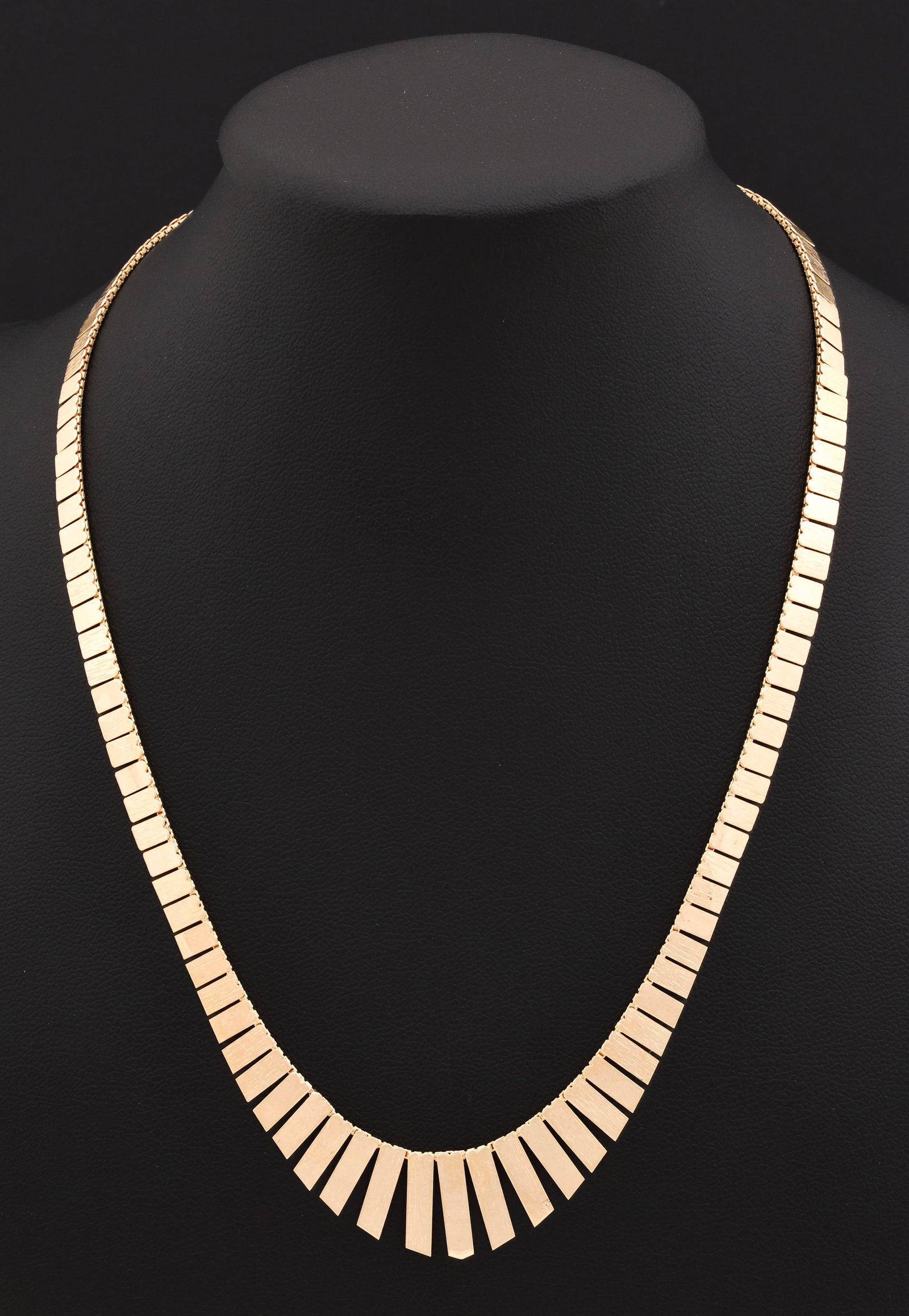 14k YG Necklace: 14K yellow gold Cleopatra necklace with graduated rectangular fringe links. 16" and 6.8 dwt.
