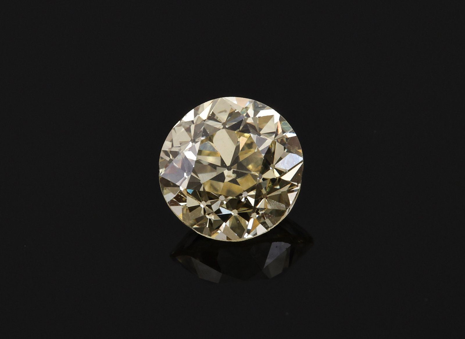 GIA 0.91 Carat Fancy Yellow Old European Cut Diamond: GIA-certified natural Old European Brilliant diamond weighing 0.91 carat, graded Fancy Yellow, natural color, even color distribution, and SI1 clarity. Measures 5.84–5.94 x 4.09 mm. Good polish, Fai