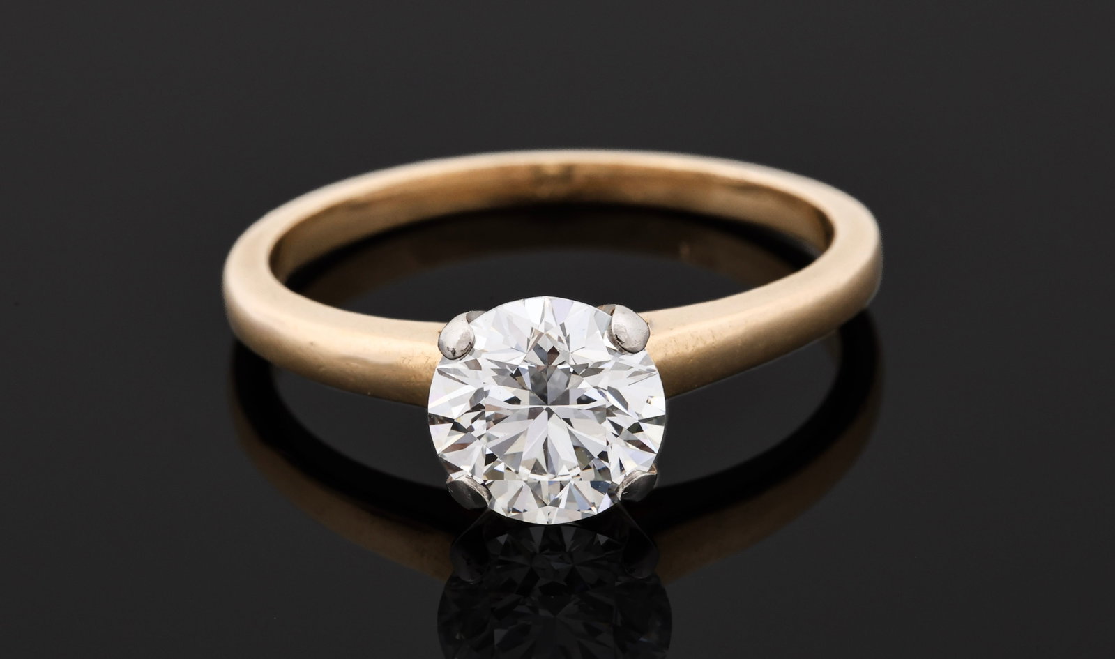 GIA Jabel 18k YG 1.72 Carat Diamond Solitaire Ring: 18K yellow and white gold Jabel solitaire ring with one natural round brilliant diamond, estimated by GIA at 1.72 carats, H-I color, VS1-VS2 clarity, measuring approximately 7.65–7.67 x 4.77 mm.