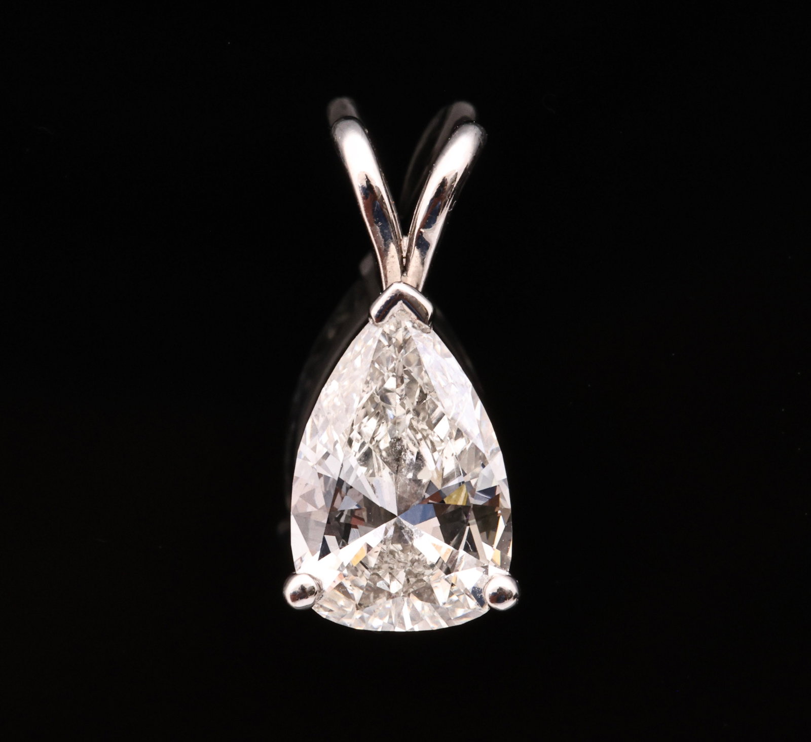 Platinum Diamond Pendant, 1.15 Carat: Platinum pendant with a 1.15 ct pear shape diamond, H-I color and SI2-I1 clarity.