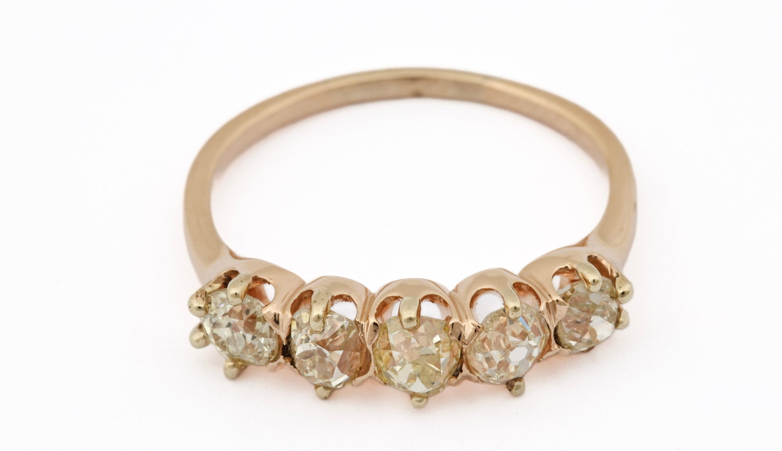14K YG Diamond Band: 14K yellow gold five stone diamond band with (5) old European cut yellow diamonds, approx. 1.00 ctw. Size 7 and 1.7 dwt.