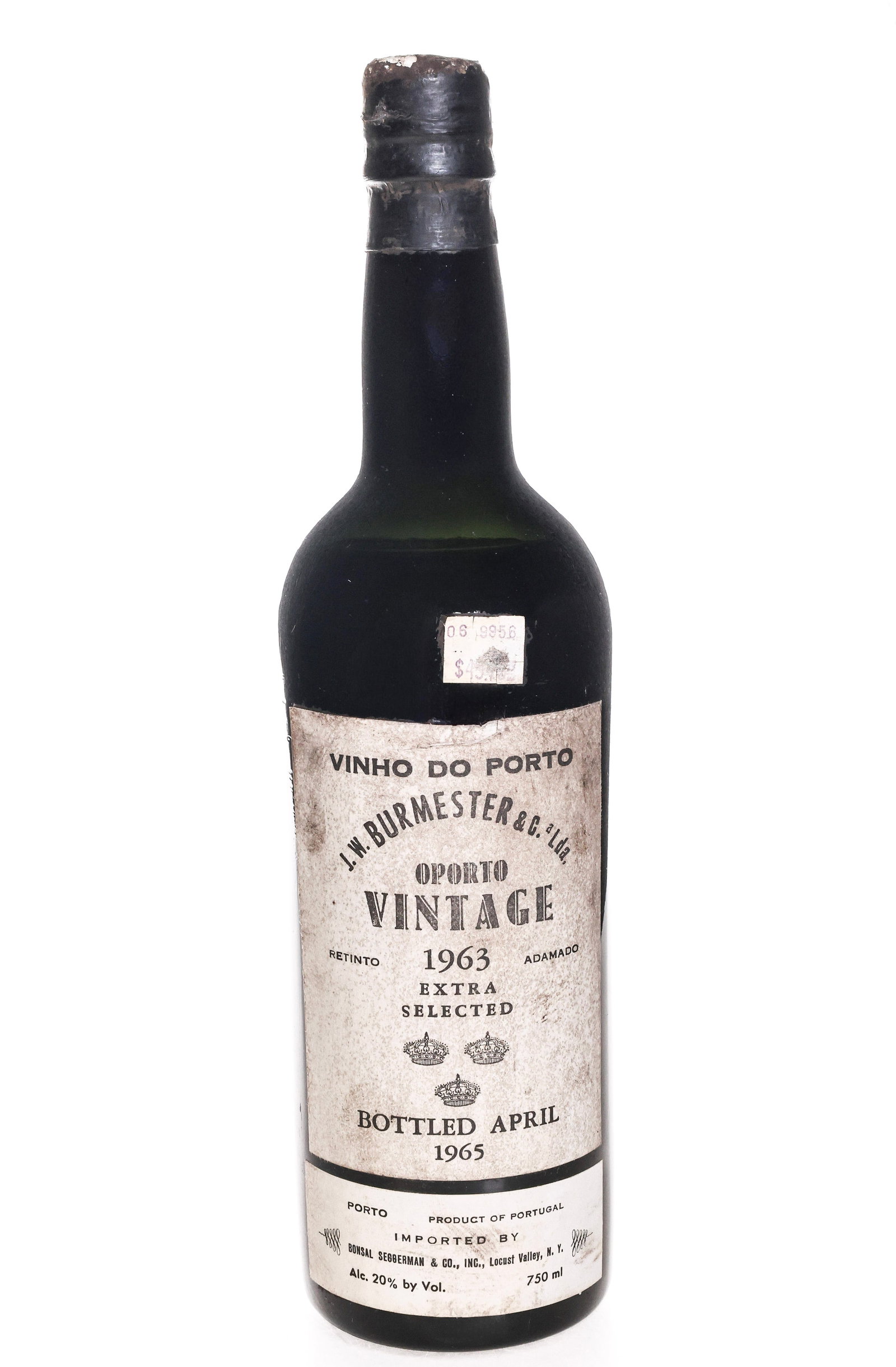 J.W. Burmester Oporto Vintage 1963: Port wine, J.W. Bermester & C. Lda., 1963 extra selected, bottled April 1965, 750 ml. Mid shoulder fill. The label shows foxing/staining, and is loose at the top with a push; capsule is original,