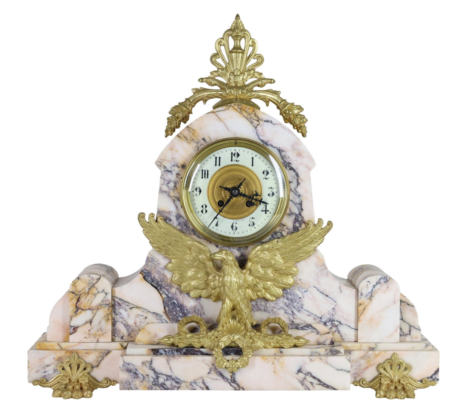 French Mantel Clock: Variegated marble architectural mantel clock with ormolu mounts including an eagle with outstretched wings perched on a scepter decorated with wreath and ribbons, a palmette, urn, and cornucopia crest