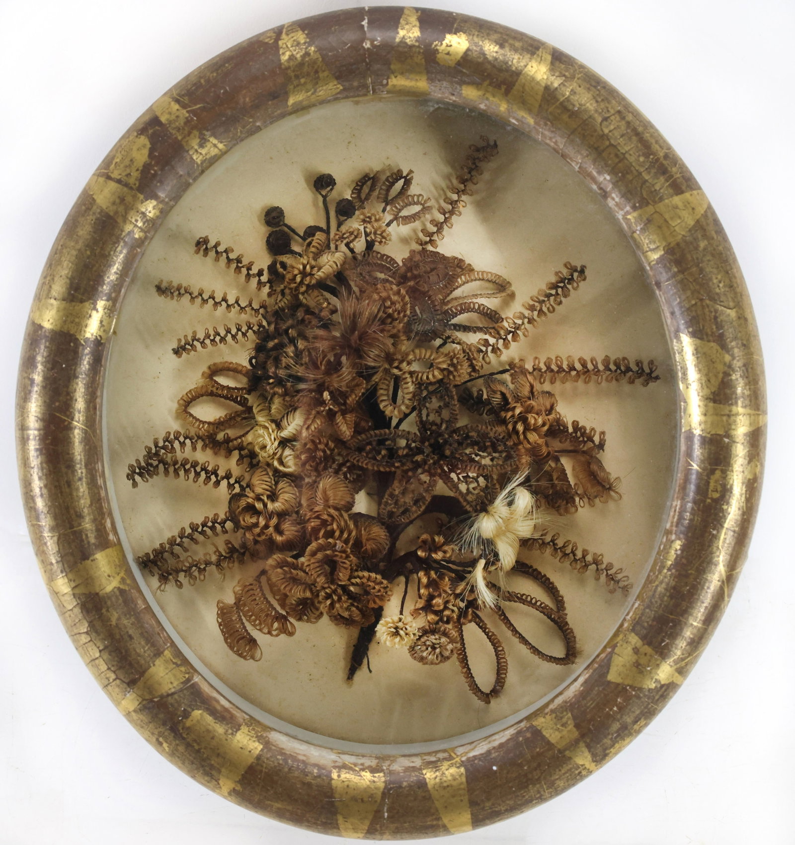 Victorian Hair Art: Bouquet of flowers made from various colors of hair set with wire, mounted in a gilt gesso shadowbox frame. Bouquet approx. 7"h x 6"w, 9.5"h x 8.5"w x 2.5" thick framed