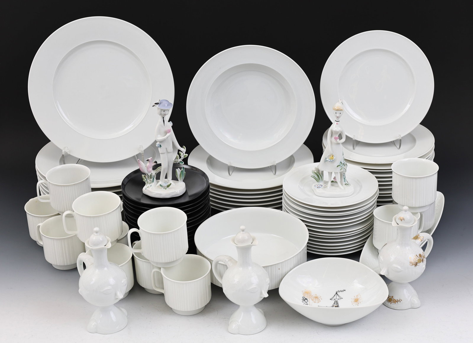 Tapio Wirkkala, Bjorn Wiinblad, and Raymond Peynet for Rosenthal Porcelain Tablewares: Rosenthal Studio-Linie "Variations" porcelain pieces designed by Tapio Wirkkala, including a vegetable serving bowl (3"h x 7"w), dinner plates (8, 10.25"w), rim soup bowls (8, 9"w), salad plates (13, 
