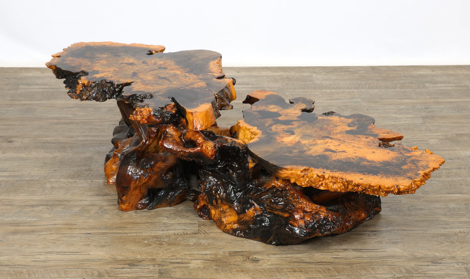 Live Edge Buckeye Burlwood Coffee Table: Two-tier coffee table made from sculpted live edge buckeye burlwood and root base with an epoxy coating. 16"h x 59"w x 25"d