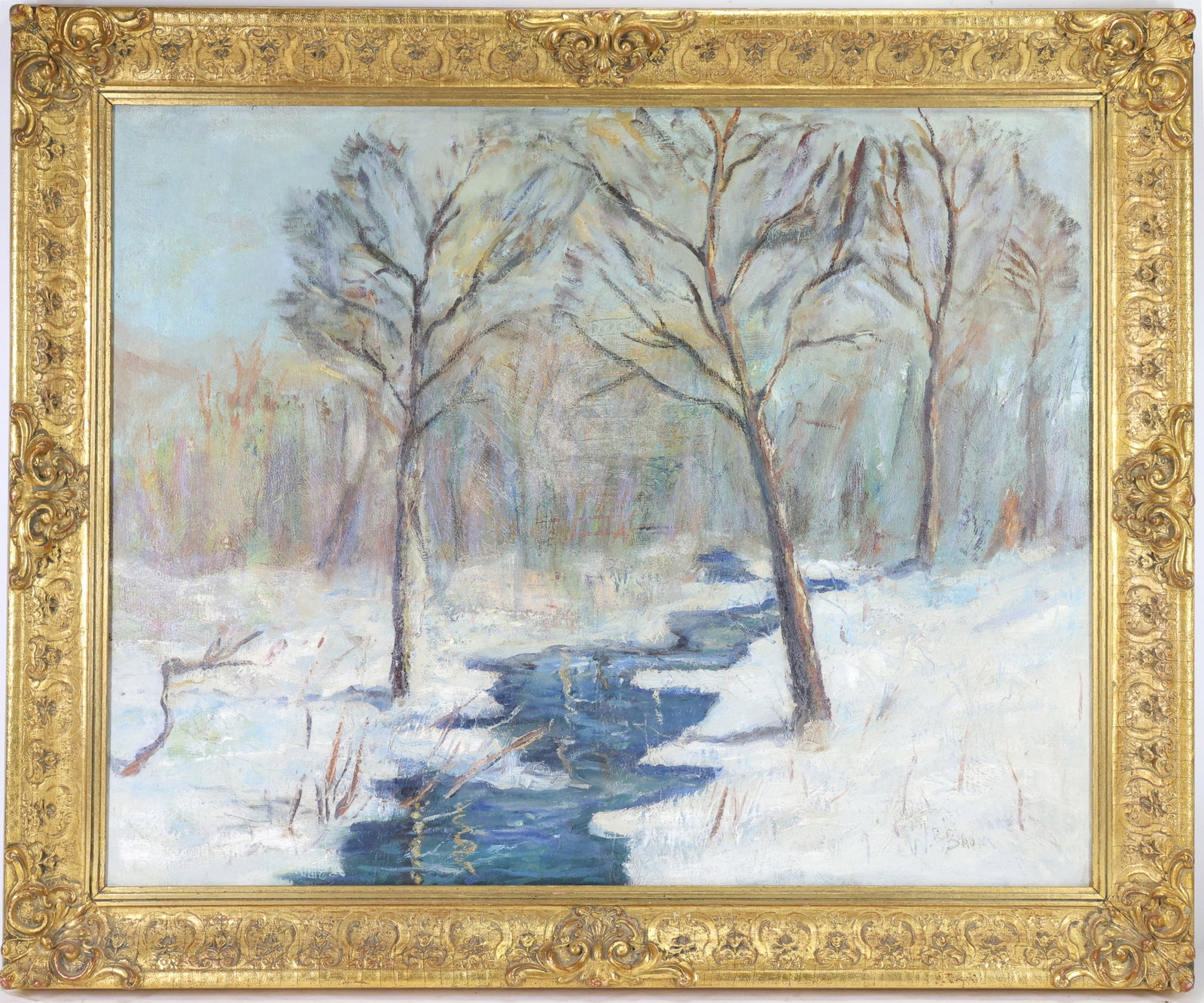 Walter Emerson Baum (1884 - 1956): Oil on canvas, SLR. Impressionist winter landscape with a stream winding through a snow covered forest. 24"h x 30"w and 29.5"h x 35.5"w framed.