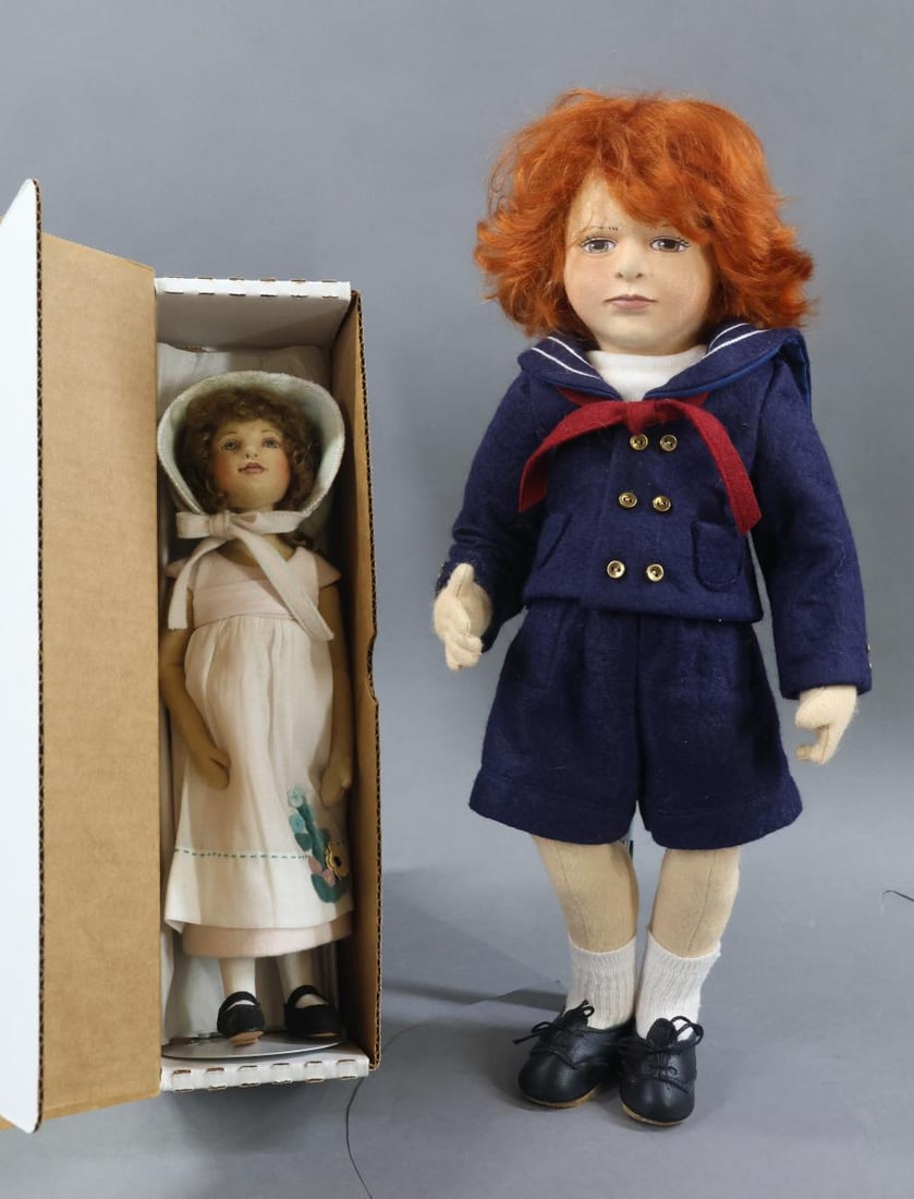 MAGGIE IACONO.: Pair of dolls. 16" Tagged "Christopher" #4/100. No box. Condition: he may be missing a hat. MIB 10 1/2" "Meadow", souvenir from the UFDC 2009 Convention. Condition: nothing observed. This lot is