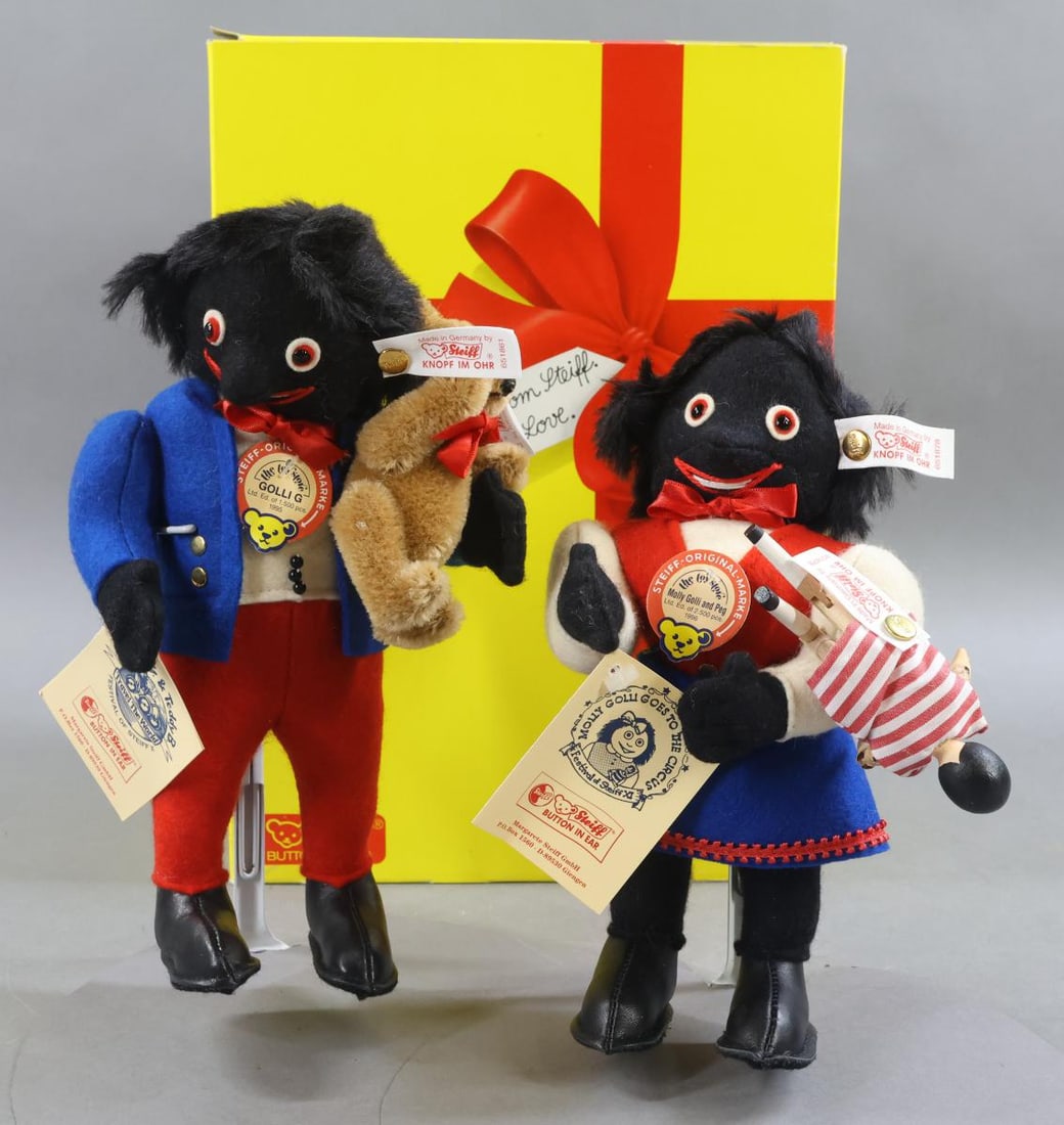 STEIFF.: Pair of 1996 STEIFF GOLLI Dolls - "Molly Golli Goes to the Circus". 9" Molly Golli and Peg" and 9" "Golli G. & Teddy B." Ltd. Ed. 1037/2500, made exclusively for The Toy Store. 651878. (2) Stands.