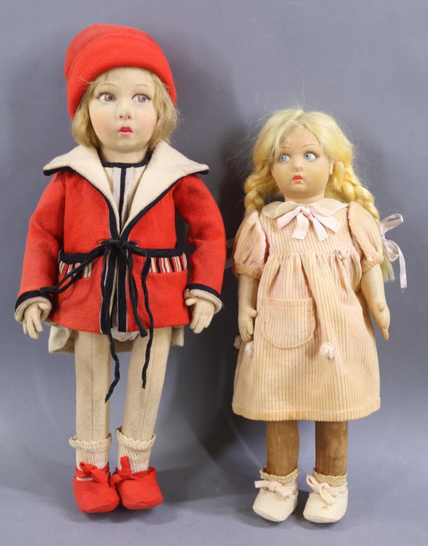 CLOTH DOLLS.: Pair of 1930's LENCI dolls. Both dolls have mohair wigs, painted side glance eyes. They are dressed in factory original clothing and felt shoes. Doll 1) 14" has blonde braids, blue eyes. She is