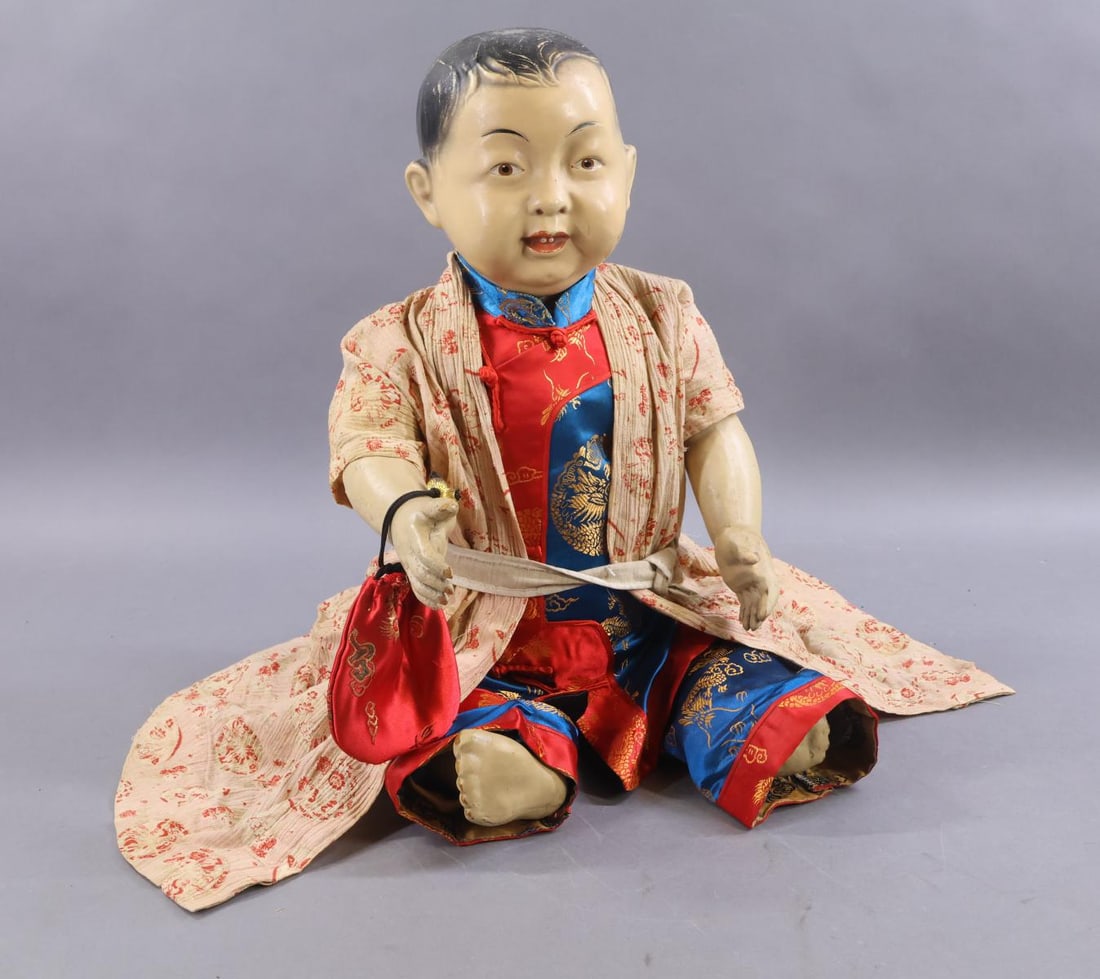 COMPOSITION DOLLS.: 23" F & C SUPPLY CO., NY Male Chinese doll. This company was in operation in the 1920's and was a Fair and Carnival Supply Company. It was a major New York City wholesaler that supplied novelty dolls