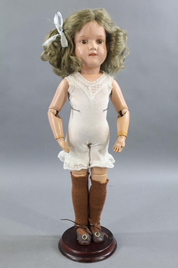 SCHOENHUT.: 19" Model No. 316 "Miss Dolly" doll, 1915-1920. Brown painted eyes, closed mouth with (4) painted teeth. Replaced antique tosca mohair wig. Body has the incised mark on back of torso. Dressed in