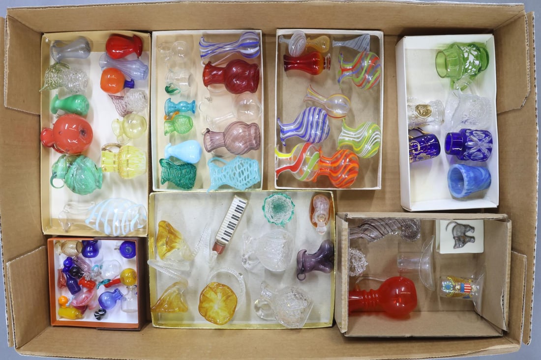 MINIATURES.: LOT of glass miniatures. (70+ pcs.) 1/2" - 3 1/2". Pitchers, vases, mugs, perfume bottles, bottles, hats, basket, ornamental. Various colors and textures. (1) Pitcher is Urainian glass and glows when