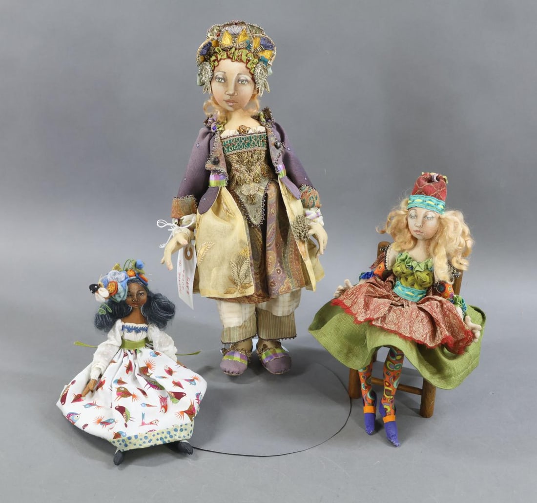 CONTEMPORARY ARTIST DOLLS.: LOT of (3) cloth dolls by artist Christine Shively (Benjamin). She is a member of NIADA and OCACA. One of a kind signed 15" 2009 "Passage to India" . Stand. (Age discoloration on dress.) 10" Signed