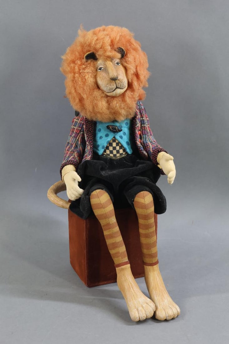 CONTEMPORARY ARTIST DOLLS.: 16" Signed 1998 "Lion" cloth character doll by artist AKIRA BLOUNT. When face of Lion is lifted up, it exposes the head of a man. Condition: age loss on mane. This lot is being sold AS IS.