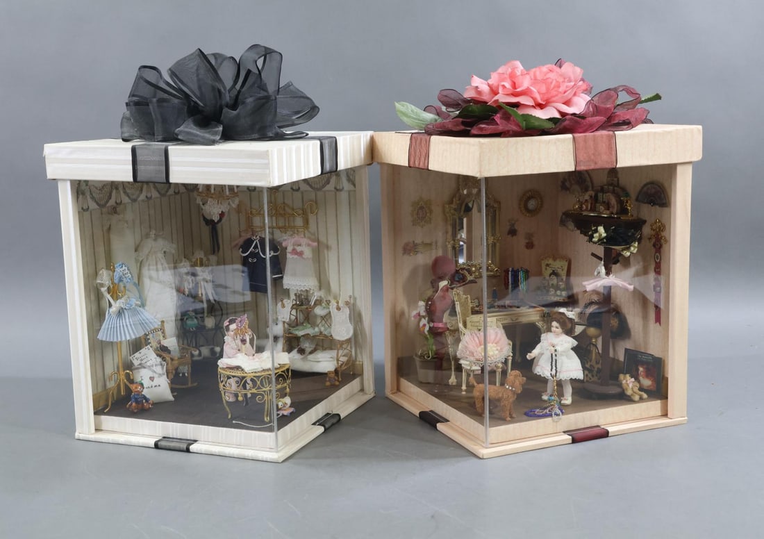 ROOM BOXES.: Pair of room boxes by artist Jan Wood Zimmerman, PA. Each box is 10" T x 8 1/2" x 8 1/2" . Open on two sides with the other two sides being the background. 2002 "Nursery" has a bisque child doll