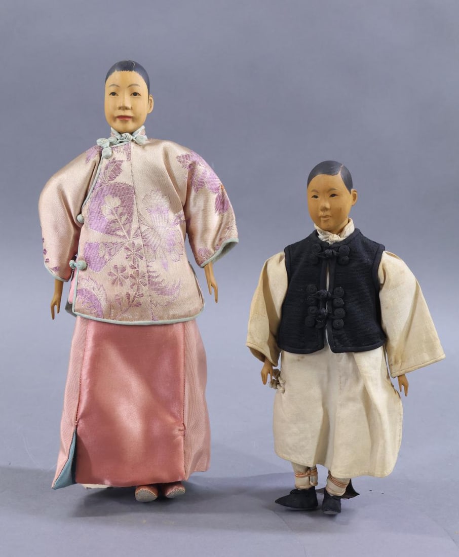 DOOR OF HOPE.: Pair of all original dolls. 11" "Lady" wearing tunic with frog closures and long skirt. Cotton undergarments. Slipper type shoes. Carved hands and single beehive bun. 9" "School Boy in Cotton". He is