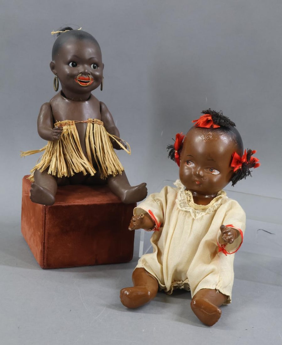 BLACK DOLLS.: Pair of dolls. Bisque - 9 1/2" HEUBACH KOPPLESDORF 463-13/0 GERMANY "South Seas Island" doll with solid dome head, painted black hair. Hole on top of head where hair comes out. Black GOOGLY sleep