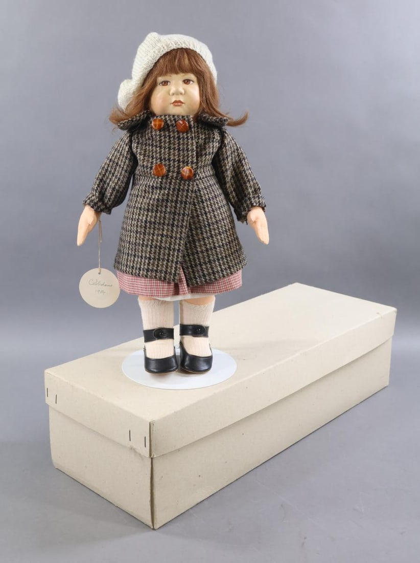 ARTIST DOLLS.: 16" Cloth doll by English doll artist Christine Adams. Hang tag reads: Tiny Tots, and is signed C. Adams, 1984. Back is signed C. Adams, Series "H" No. 22. She has hand painted features, brown HH