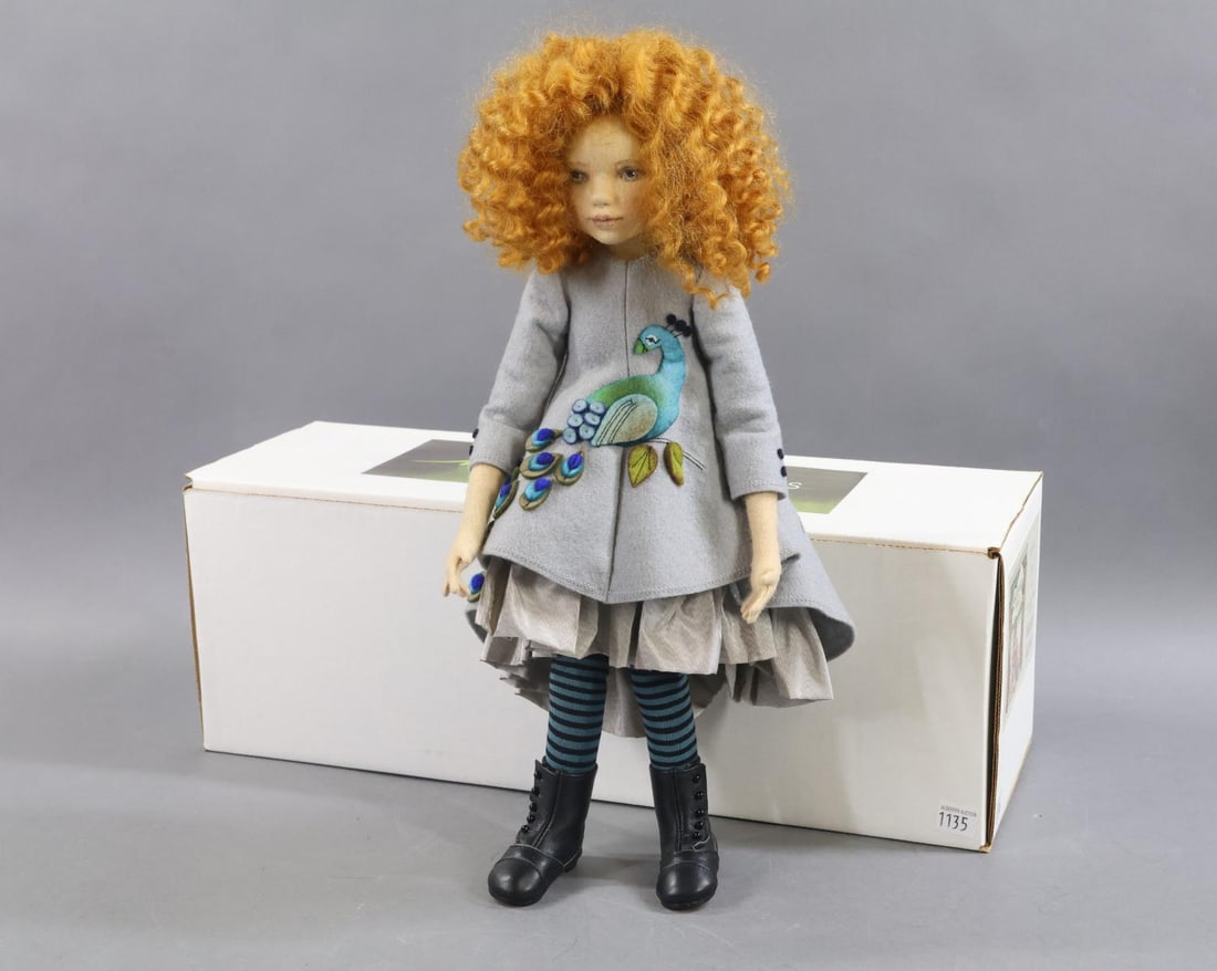 MAGGIE IACONO.: 16" MIB all original "Penny" doll, 36/40. Curly red mohair wig. Doll is marked differently with the label glued to back of her torso. There is no additional paper label sewn to her clothing. No COA.