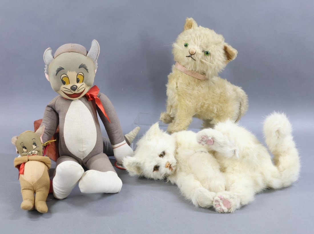 VINTAGE ANIMALS.: LOT of (3) CATS. 16" TAGGED 1949 "TOM & JERRY" stuffed cloth toy, Georgene Novelties, Inc. "JERRY" is 7 1/2". 10" T. Standing white mohair Cat with swivel head, green glass eyes. (Loss on mohair.) 12"
