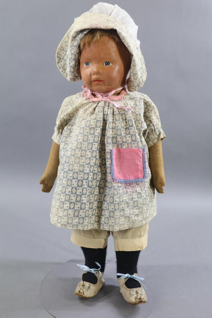 CLOTH DOLLS - KAMKINS.: 18" Unmarked KAMKINS doll with painted blue eye, honey blonde mohair wig. Jointed cloth body with swivel head. Dressed in vintage clothing. Cloth shoes. Condition: age discoloration on body. Age loss