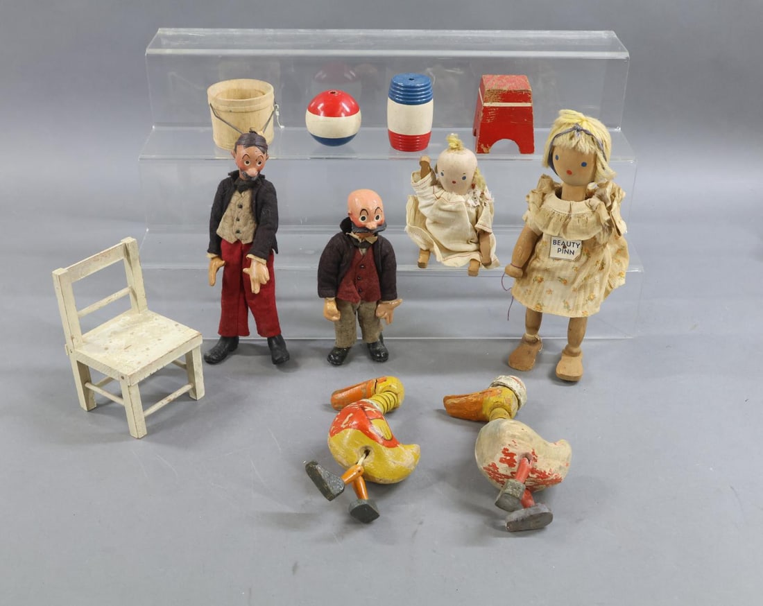 SCHOENHUT & BUCHERER.: LOT. SCHOENHUT - circus props. chair, barrel, ball, pedestal, bucket. Pair of wooden PINN dolls - "Beauty Pinn" (missing left arm) and "Baby Pinn". Pair of "Quacky Doodles" Ducks. Condition: as