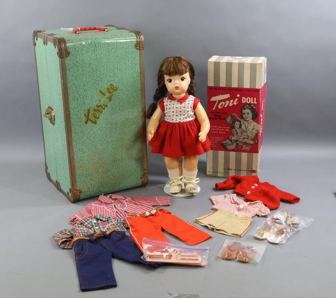 1940's -1960's DOLLS.: LOT. Pair of dolls, trunk. TERRI LEE - 16" Doll with brown braided wig. Marked TERRI LEE on back. Dressed in original untagged dress/panties. Oilcloth shoes, socks (loss). She comes with (2) tagged
