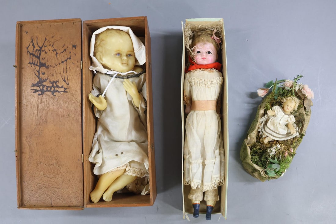 WAX DOLLS.