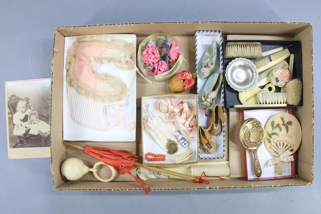 DOLL ACCESSORIES.: This is a museum deaccession lot. Celluloid brushes, combs, mirror, rattle, other. Brass hand mirror Elsinore tower, Cincinnati, OH.Christmas 1886 wooden fan. Shoes - "7" 2 3/4" (French style) blue