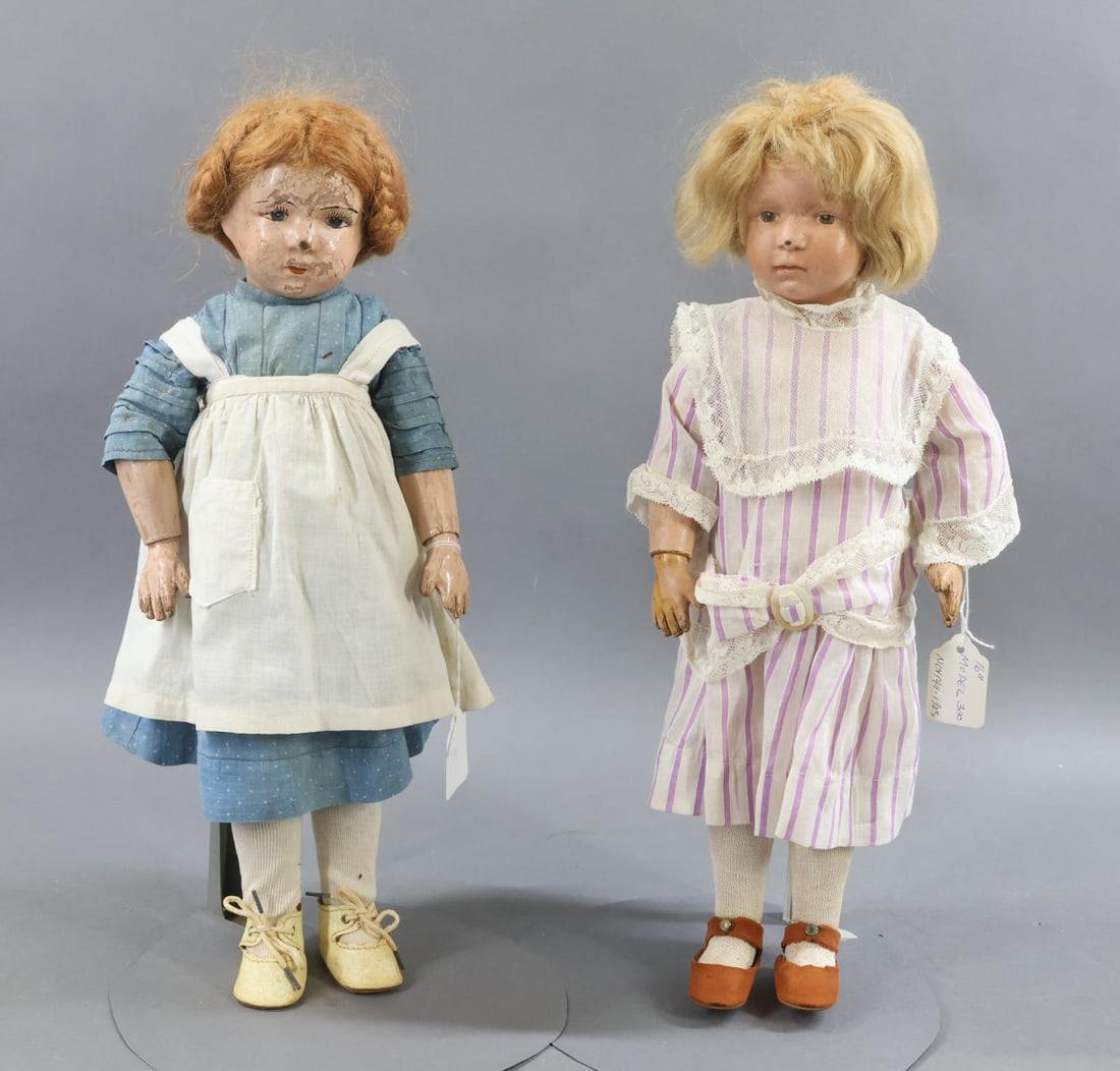 SCHOENHUT.: Pair of 16" Model No. 300 Schoenhut dolls. These were made from November 1911 - 1923. They originally had the incised mark on the back of their torsos but it only shows on the doll with the blonde